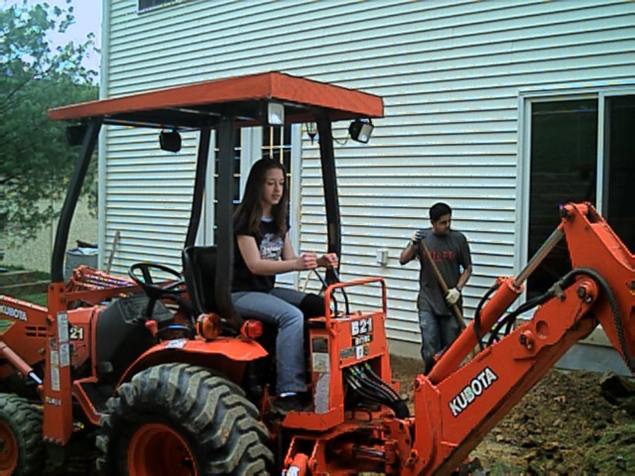 This is my daughter, Danielle trying out her skills as a machine operator ( actually, she was pretty good!!)
