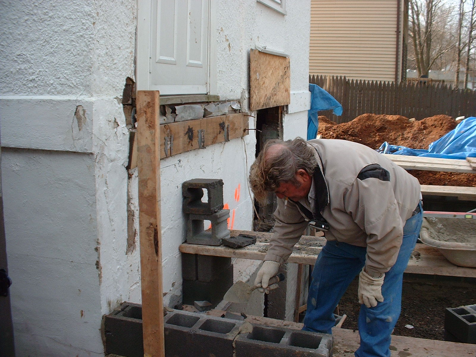 This is my Dad laying block. He and his men did the block work.