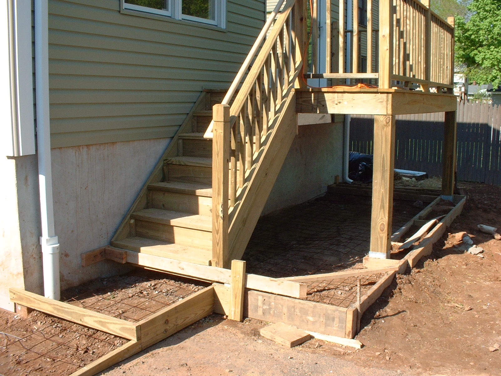 A slab will be poured below the deck to store garbage cans.