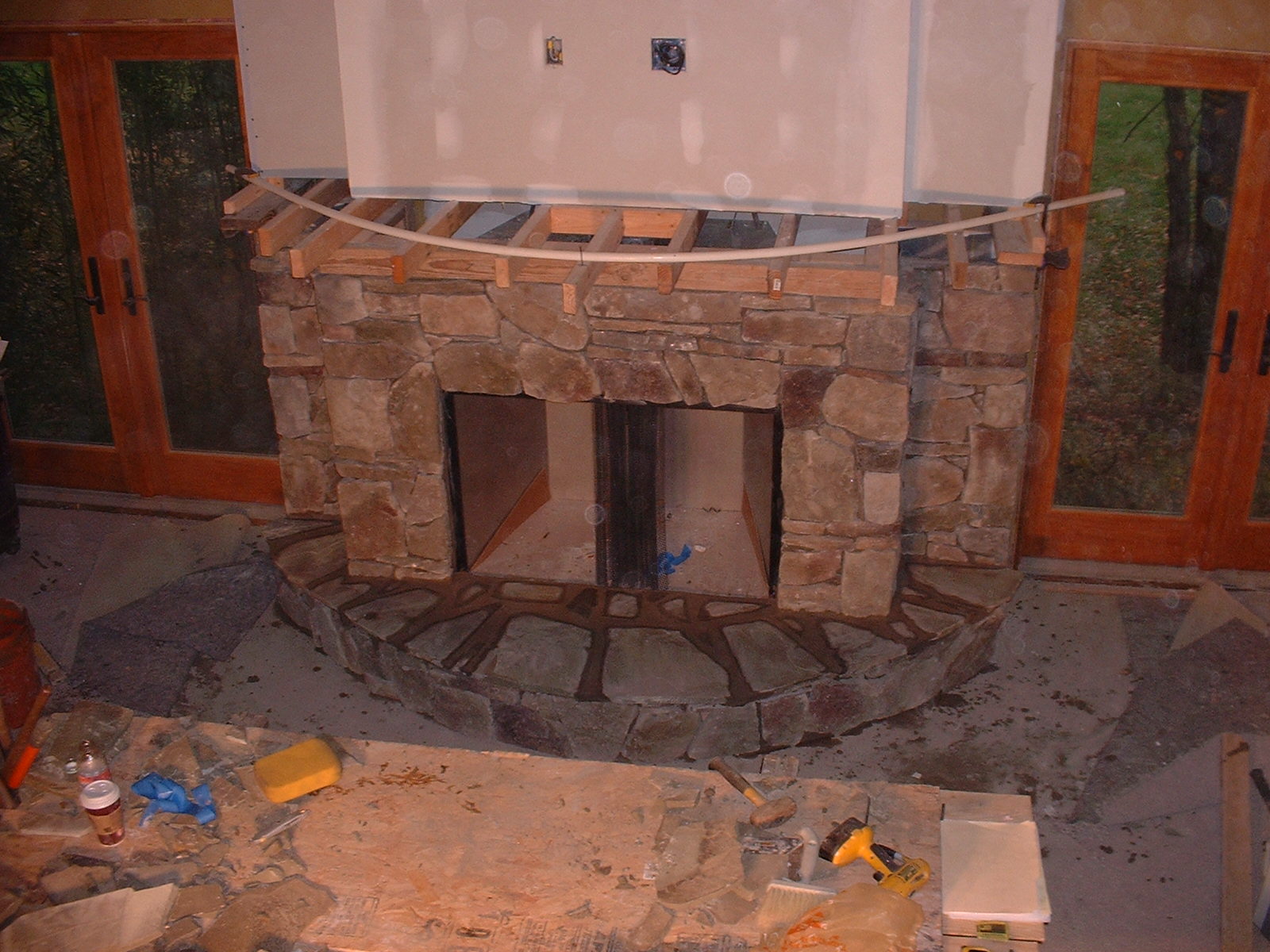 The top of the hearth is done with a natural stone.