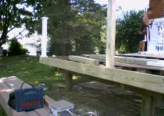 The existing deck was rebuilt, and extended into the new addition.