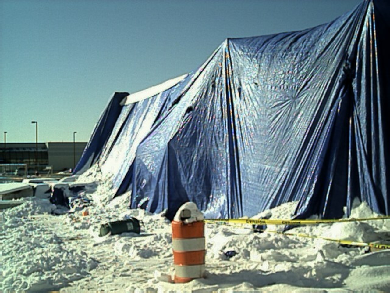The tarps barely survived. we had to clear off the snow from the tops to relieve the pressure.
